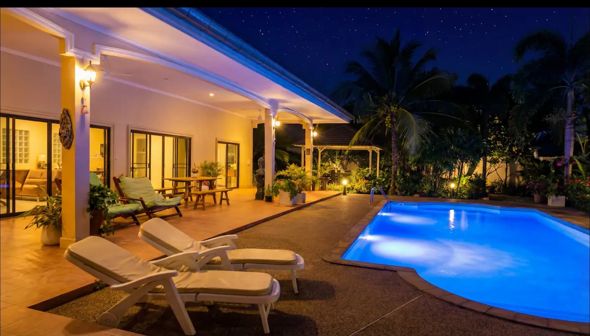 Private pool lit up at night at the AYEDA 5-bedroom pool villa in Ao Nang, Krabi