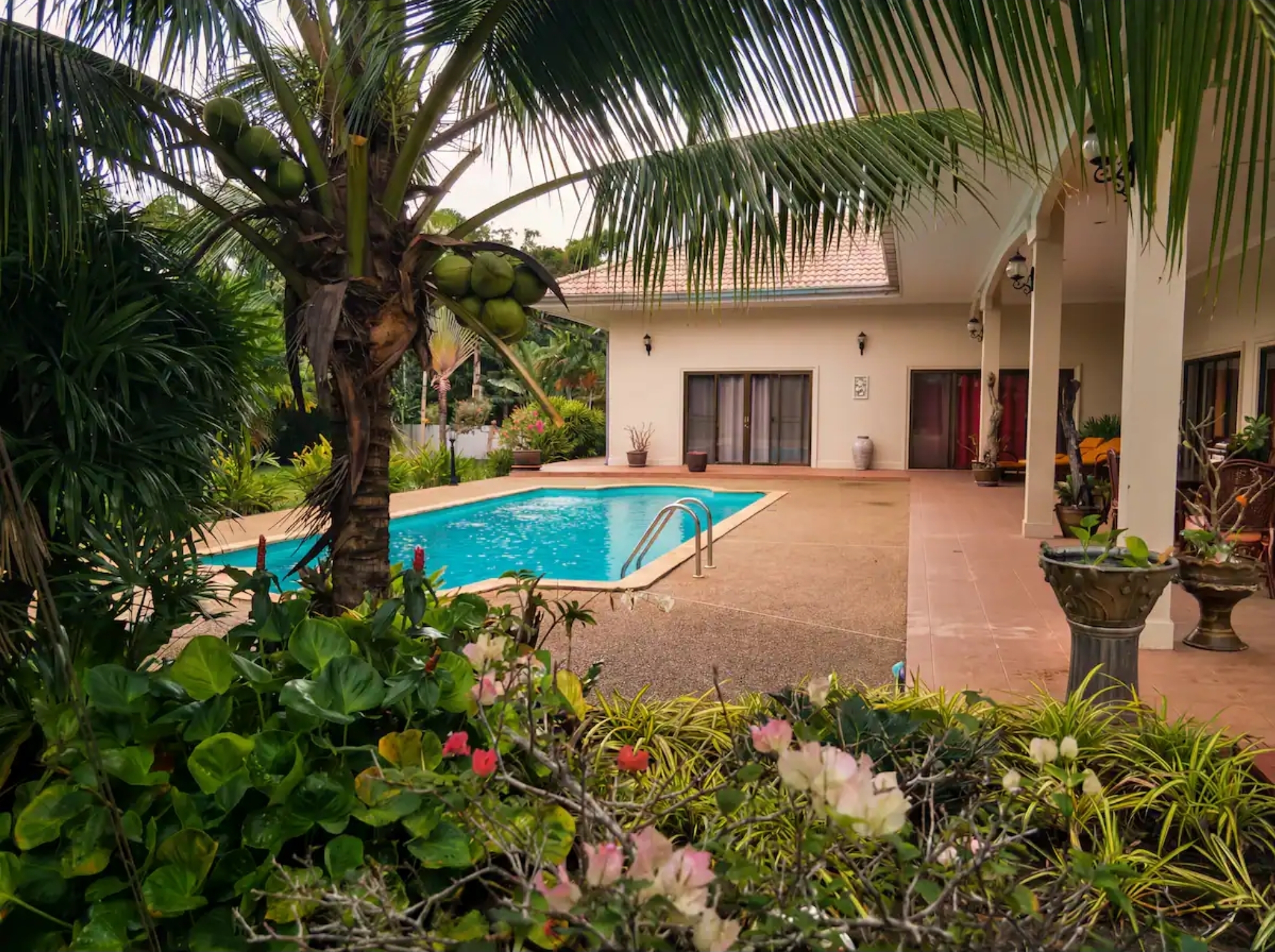 Private pool and tropical garden at the AYEDA group pool villa, Krabi