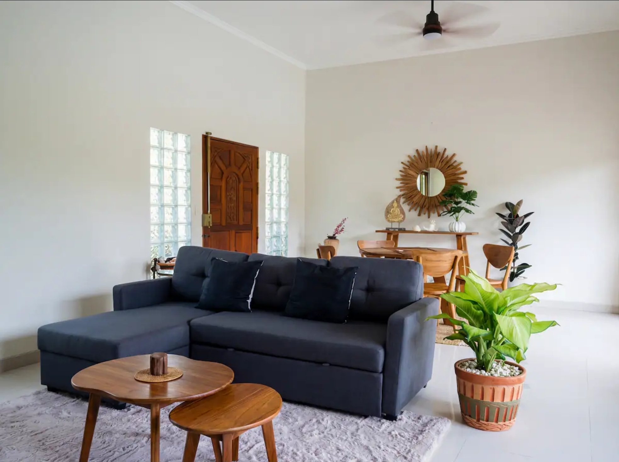 Comfortable group living area with sofa at the AYEDA pool villa